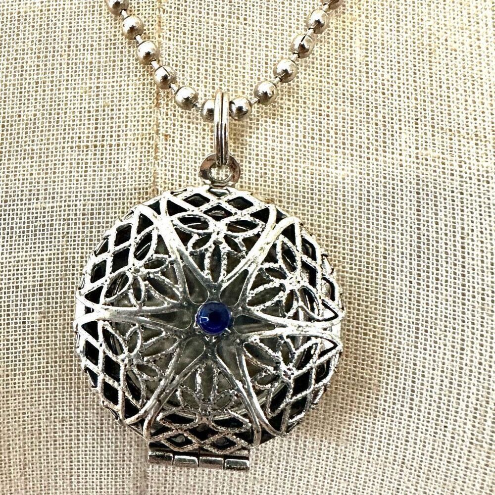 Silver tone and blue locket  pendant necklace